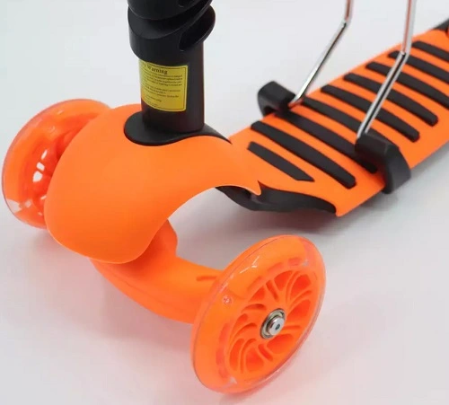 Dětská balanční koloběžka 5v1 s LED kolečky a vodící tyčí – oranžová
