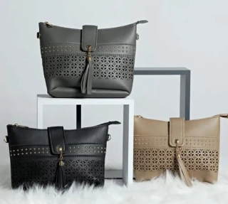 Dámská crossbody kabelka s vyřezávaným efektem 