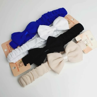 Látková čelenka zdobená mašlí